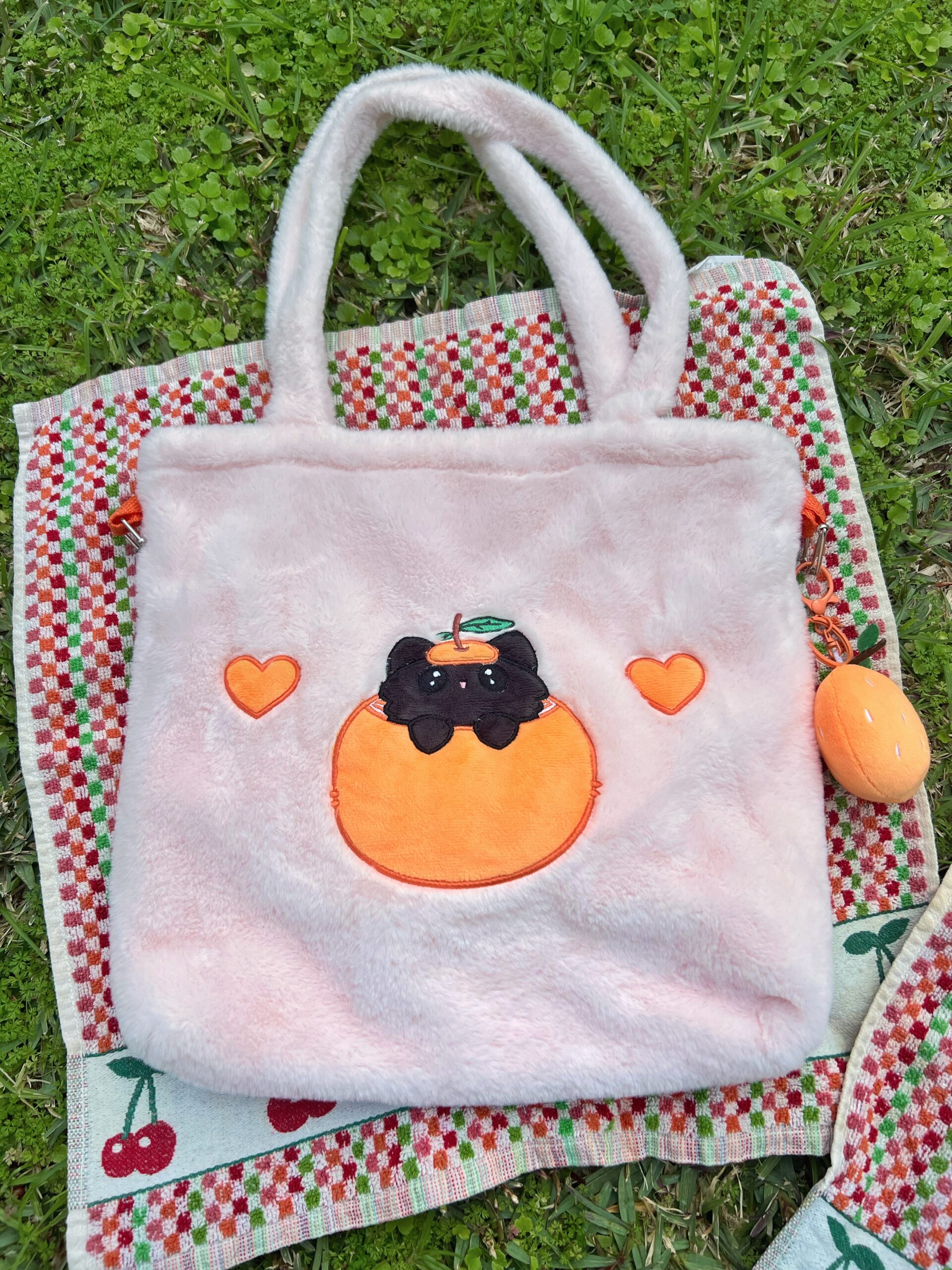 Bolso bandolera de peluche rosa con forma de gato mandarino Peluso