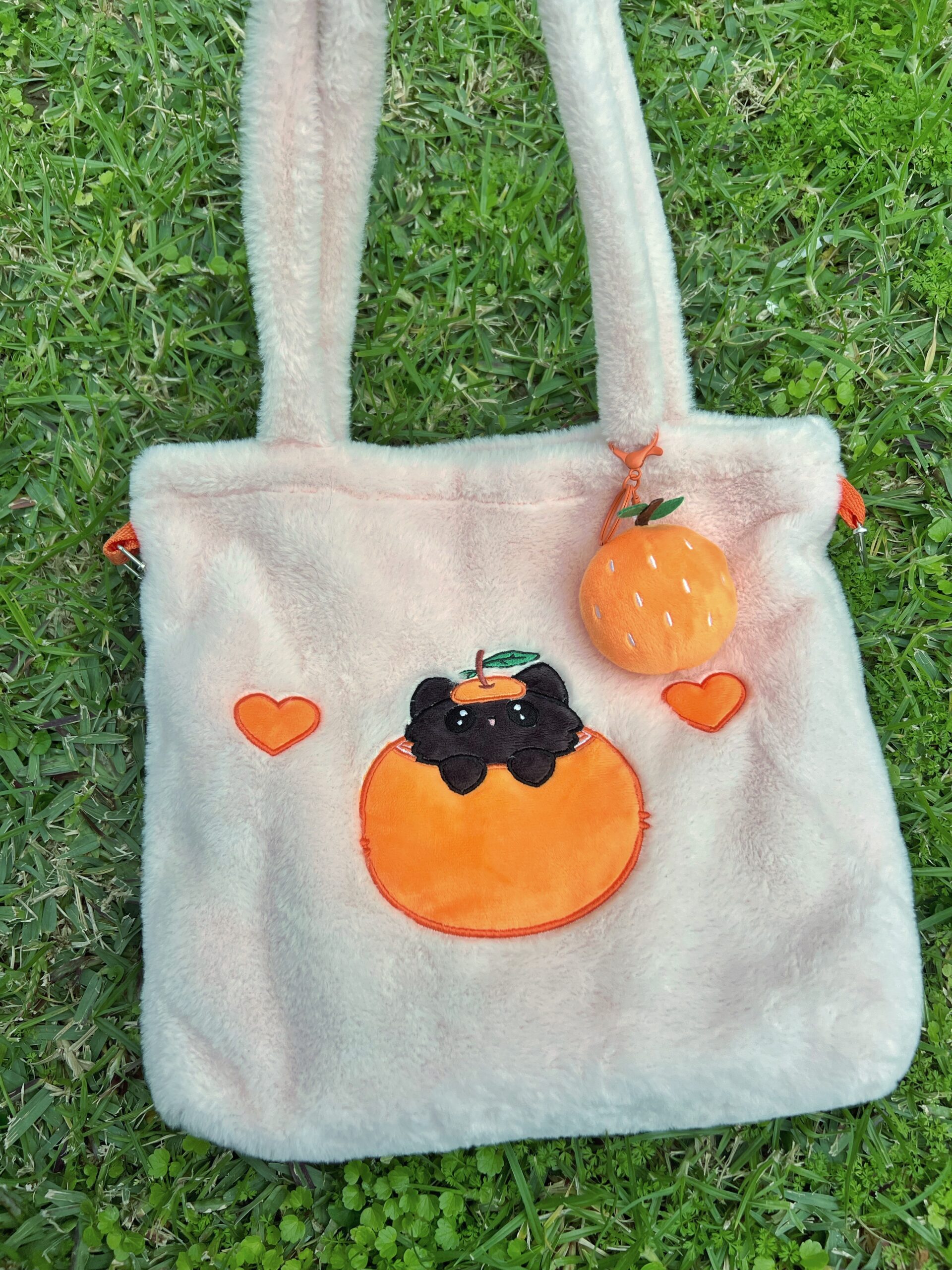 Bolso bandolera de peluche rosa con forma de gato mandarino Peluso